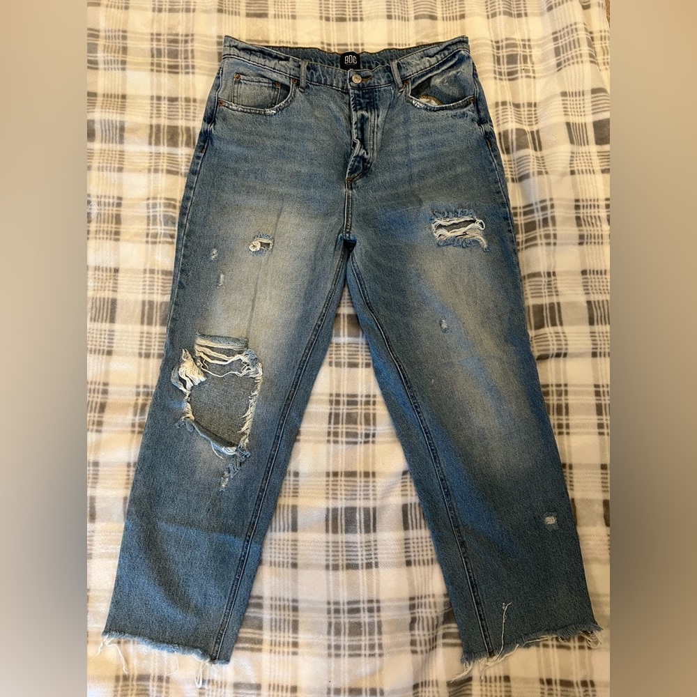 BDG distressed jeans. Size 32 with button fly and raw hem.